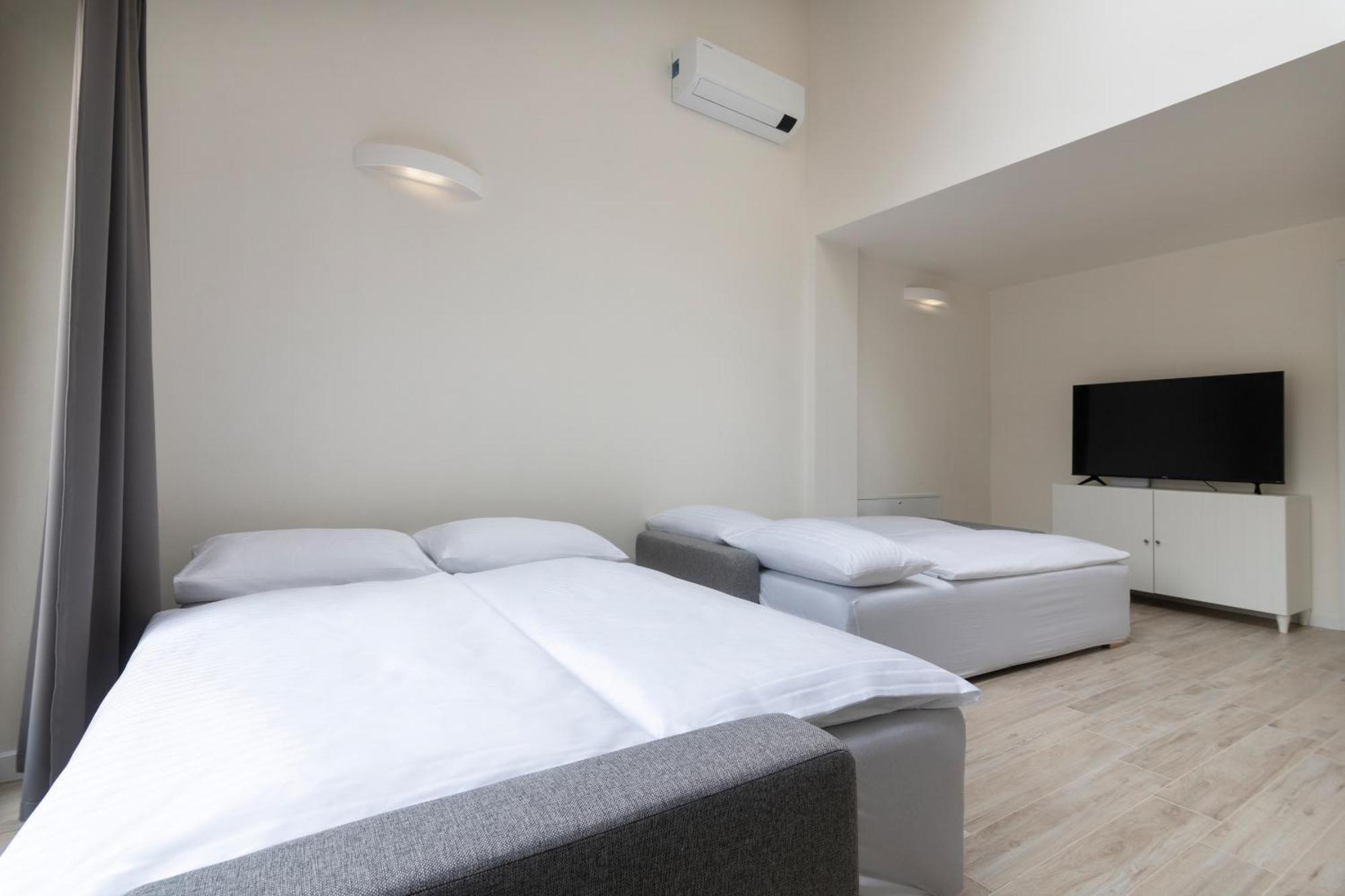 Kinsky Garden Apartments And Suites By Dwellfort Prag Værelse billede